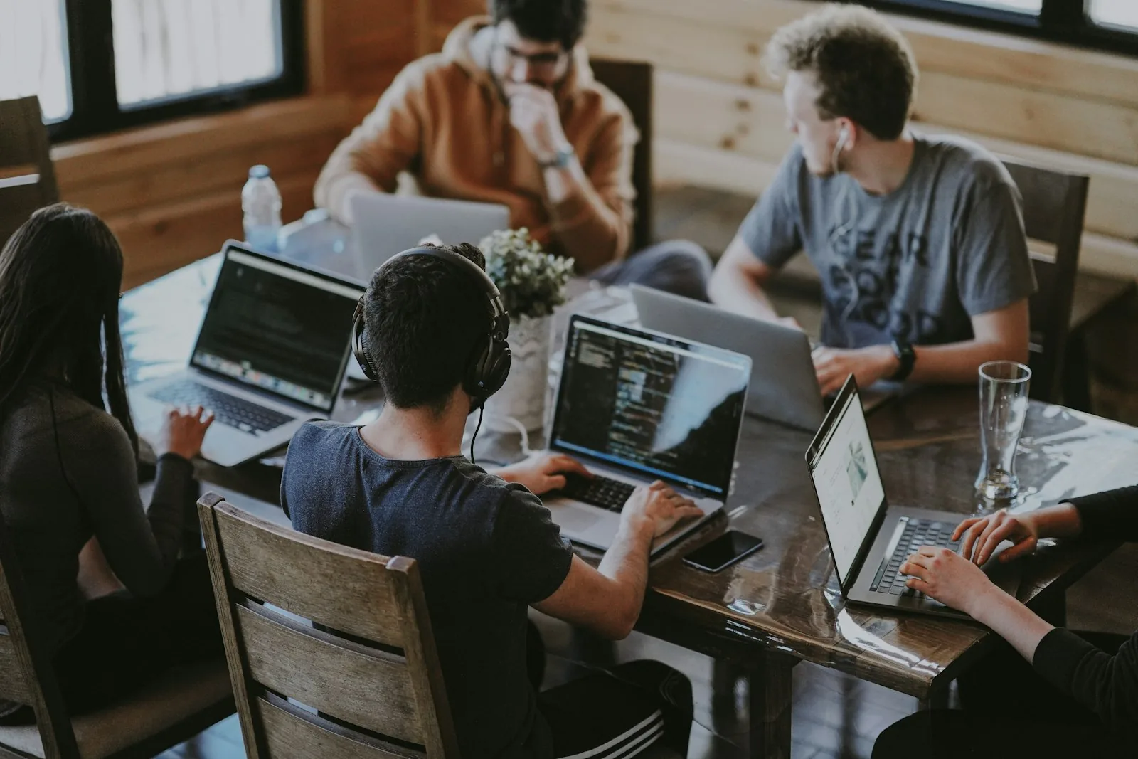 Team reviewing work together at a table
